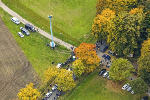 Aerial photo, thousands of spectators watched with great interest as the Gersteinwerk chimney was blown up half an hour late. The 282 metre high RWE chimney fell exactly into the prepared gravel bed. City limits of Werne, Hamm North Rhine-Westphalia, Germany