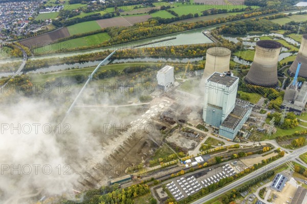 Aerial photo, thousands of spectators watched with great interest as the Gersteinwerk chimney was blown up half an hour late. The 282 metre high RWE chimney fell exactly into the prepared gravel bed. City limits of Werne, Hamm North Rhine-Westphalia, Germany
