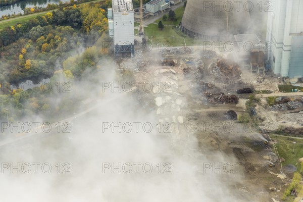 Aerial photo, thousands of spectators watched with great interest as the Gersteinwerk chimney was blown up half an hour late. The 282 metre high RWE chimney fell exactly into the prepared gravel bed. City limits of Werne, Hamm North Rhine-Westphalia, Germany