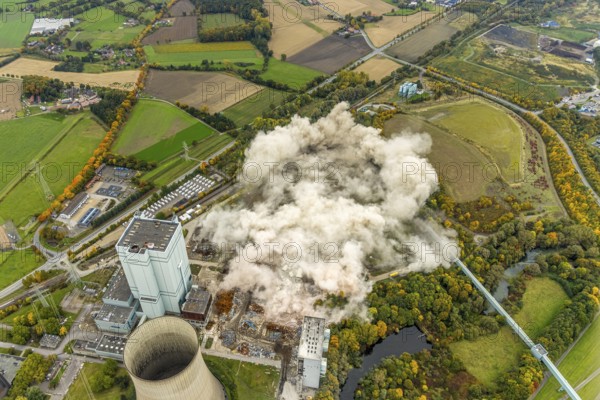 Aerial photo, thousands of spectators watched with great interest as the Gersteinwerk chimney was blown up half an hour late. The 282 metre high RWE chimney fell exactly into the prepared gravel bed. City limits of Werne, Hamm North Rhine-Westphalia, Germany