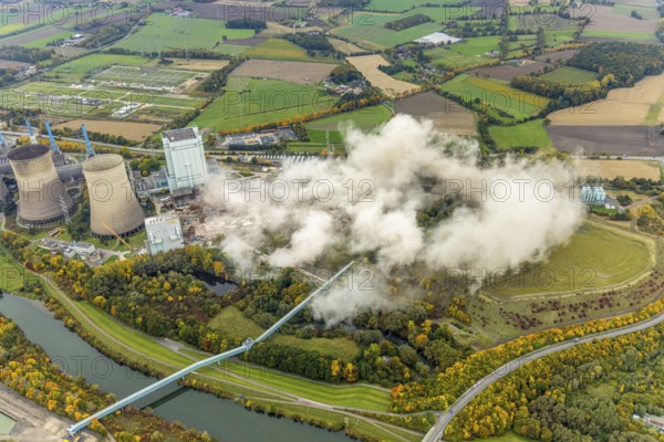 Aerial photo, thousands of spectators watched with great interest as the Gersteinwerk chimney was blown up half an hour late. The 282 metre high RWE chimney fell exactly into the prepared gravel bed. City limits of Werne, Hamm North Rhine-Westphalia, Germany
