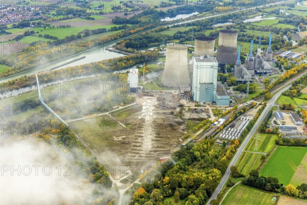 Aerial photo, thousands of spectators watched with great interest as the Gersteinwerk chimney was blown up half an hour late. The 282 metre high RWE chimney fell exactly into the prepared gravel bed. City limits of Werne, Hamm North Rhine-Westphalia, Germany