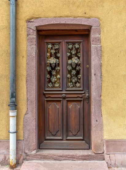 Ornamented door seen in Kaysersberg, a historical town and former commune in Alsace in northeastern France