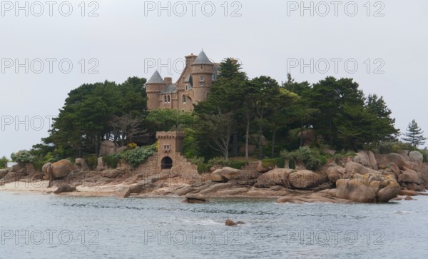 Idyllic castle near Perros-Guirec at the Pink Granite Coast in Brittany, France