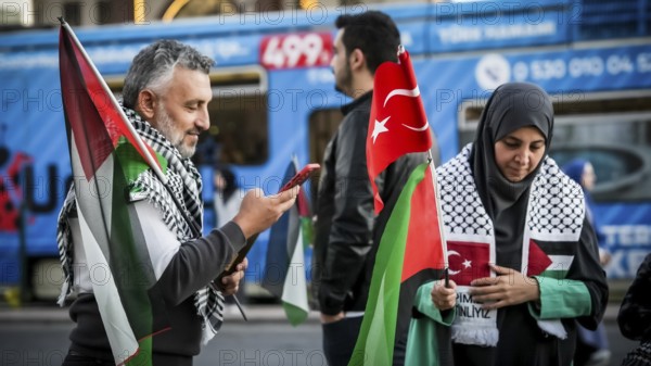 Gaziantep, Türkiye – October 11, 2025: Children and women wearing keffiyehs and carrying Palestinian flags and banners in support of Gaza participate in a massive rally following the announcement of a ceasefire, the withdrawal of Israeli forces, and a prisoner exchange between Hamas and Israel, Gaziantep, Türkiye