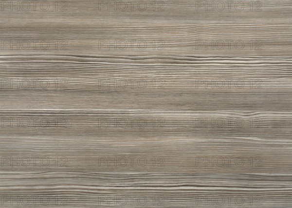 A full frame grey brown wood grain surface