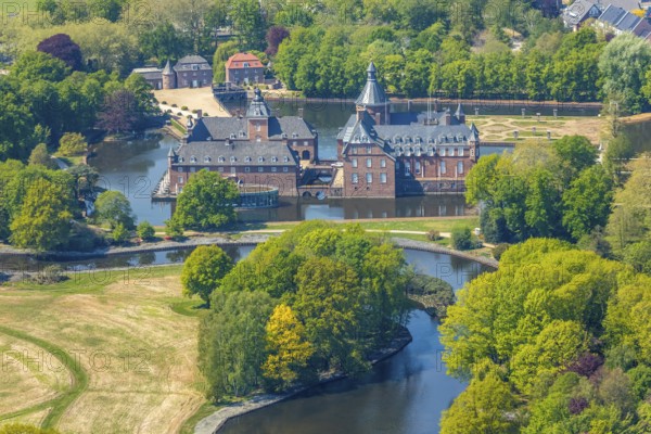 Aerial view, moated castle Anholt, Isselburg, Lower Rhine, North Rhine-Westphalia, Germany, castle, castle courtyard, DE, Europe, river Issel, gastronomy, green trees, courtyard, hotel, aerial view, aerial photography, aerial photography, restaurant water pavilion in the Romantik Parkhotel moated castle Anholt, castle, castle grounds, castle garden, castle park, sight, overview, defence system, bird's-eye view, moat, moated castle, moated castle, bird's-eye view, overview