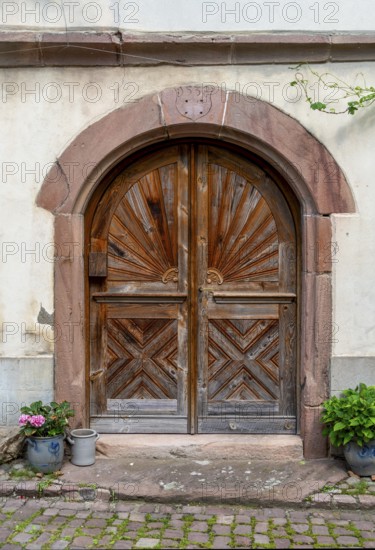 Historic door seen in Kaysersberg, a historical town and former commune in Alsace in northeastern France