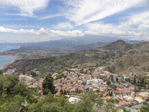Distant aerial view of Taormina, a comune in Sicily, Italy