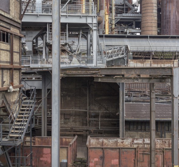Weathered rusty industrial scenery with old corroded steel plates girders