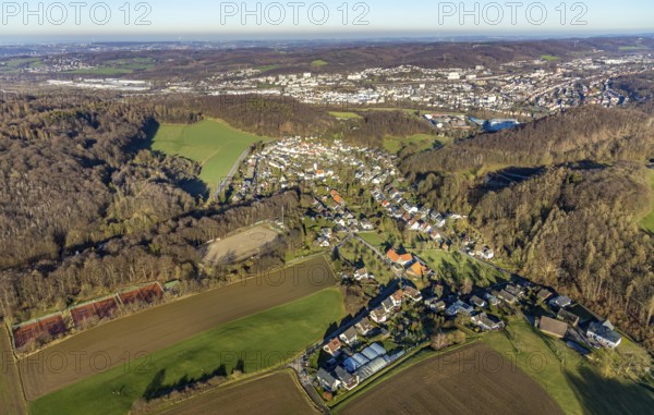 Aerial view, local view Holthausen, Evang. Gnadenkirche, Holthausen, Hagen, Ruhr area, North Rhine-Westphalia, Germany, DE, Europe, religious community, place of worship, property tax, Hegge, Holthauser Straße, Holthauser Tennisverein e.V., real estate, church, parish, denomination, aerial view, aerial photography, aerial photography, religion, sport, tennis, tennis facility, tennis courts, tennis club, overview, bird's-eye view, wooded area, woodland, living and life, residential area, residential buildings, residential quality, housing estate, birds-eyes view, overview