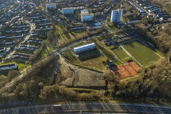 Aerial view, district sports facility Emst, BAustelle, Emst, Hagen, Ruhr area, North Rhine-Westphalia, Germany, motorway A45, DE, Europe, property tax, Haßleyer Straße, high-rise buildings, real estate, aerial view, aerial photography, aerial photography, apartment buildings, local supply centre, sports club Concordia Hagen 1967 e.V., Tennisclub TC Concordia Hagen e.V., overview, clubhouse 2.0 SpVg Hagen 1911, bird's-eye view, housing estate, housing and living, residential area, residential buildings, residential quality, housing estate, birds-eyes view, overview