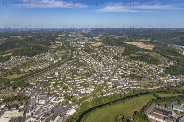 Aerial view, motorway A46, city centre view and commercial area Elseyer Straße, river Lenne, Hagen-Hohenlimburg, Ruhr area, North Rhine-Westphalia, Germany, DE, Europe, commercial enterprises, commercial area, commercial location, commercial use, property tax, real estate, industrial area, industrial location, aerial view, aerial photography, aerial photography, overview, bird's-eye view, forest area, living and working, living and life, residential area, residential buildings, residential quality, housing estate, bird's-eye view, overview