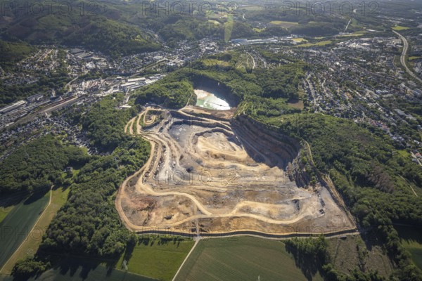 Aerial photograph, Steltenberg quarry, Hohenlimburg lime works, Hagen-Hohenlimburg, Ruhr area, North Rhine-Westphalia, Germany, DE, Europe, protected landscape Steltenberg quarry, Hohenlimburg lime works GmbH, hilly landscape, Steltenberg landscape conservation area, aerial photograph, aerial photography, aerial photography, quarry, open-cast mine, overview, bird's-eye view, overview, thyssenkrupp Hohenlimburg GmbH