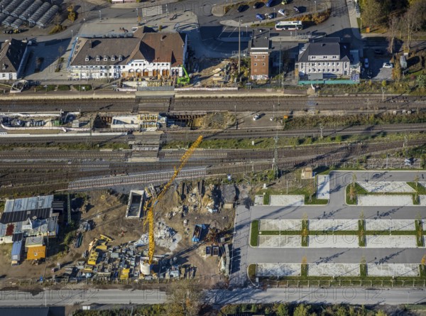 Aerial view, Haltern station, construction site conversion to a barrier-free station, Haltern town, Haltern am See, Ruhr area, North Rhine-Westphalia, Germany, railway tracks, station, station car park, construction work, construction area, building site, building plots, construction project, construction site, DE, Deutsche Bahn AG, through station, Europe, main station, central station, aerial view, aerial photography, aerial photography, overview, conversion work, bird's eye view, birds-eyes view, overview, autumn, autumn leaves, golden October, autumnal, Park & Ride car park, Park and Ride