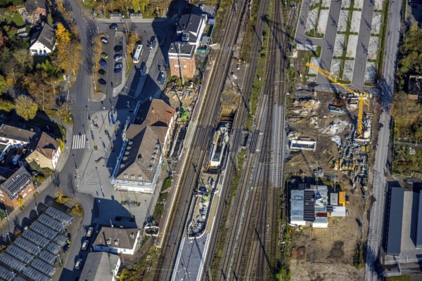 Aerial view, Haltern station, construction site conversion to a barrier-free station, Haltern town, Haltern am See, Ruhr area, North Rhine-Westphalia, Germany, railway tracks, station, station car park, construction work, construction area, building site, building plots, construction project, construction project, construction site, DE, Deutsche Bahn AG, through station, Europe, central station, main station, aerial view, aerial photography, aerial photography, overview, reconstruction work, bird's-eye view, overview, autumn, autumn leaves, golden October, autumnal