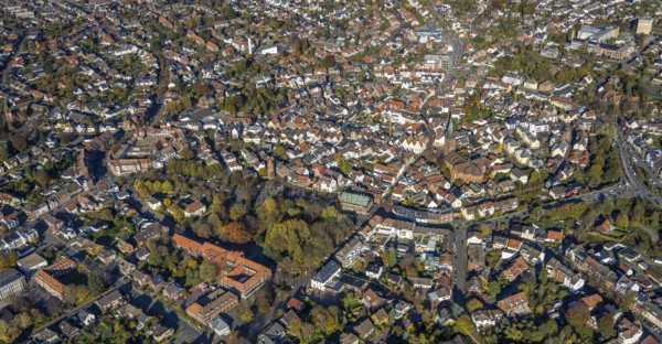 Aerial view, Old Town, Haltern Town Hall, St. Sixtus Church, historical buildings, Kardinal-von-Galen-Park, Siebenteufelsturm, Haltern am See, Ruhr area, North Rhine-Westphalia, Germany, Altstadtring, place of worship, authority, City, DE, Dr.-Conrads-Straße, ice rink, Europe, religious community, place of worship, property tax, holy place, real estate, city centre, church, parish, denomination, aerial view, aerial photography, aerial view, park, Haltern police station, town hall, religion, religious site, townscape, city area, city administration, city centre, tower, overview, bird's-eye view, Wall streets, residential area, living and life, residential area, residential buildings, quality of life, birds-eyes view, historic old town, historic landmark, overview, autumn, autumn leaves, golden October, autumnal