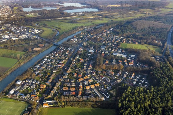 HAMM-BOSSENDORF 16.12.2020 Aerial view of the village centre on the banks of the Weser-Datteln-Kanal - river course in Hamm-Bossendorf in the state of North Rhine-Westphalia, Germany // Village on the banks of the area Weser-Datteln-Kanal - river course in Hamm-Bossendorf in the state North Rhine-Westphalia, Germany. Photo: Hans Blossey