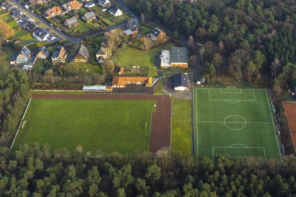 FLAESHEIM 16.12.2020 Ensemble of sports grounds of SuS Concordia Flaesheim 1969 e.V. on the Dr.-Hermann-Grochtmann-Strasse in Flaesheim in the state North Rhine-Westphalia, Germany // Ensemble of sports grounds of SuS Concordia Flaesheim 1969 e.V. on of Dr.-Hermann-Grochtmann-Strasse in Flaesheim in the state North Rhine-Westphalia, Germany. Photo: Hans Blossey, aerial photo, aerial photograph, aerial photography, aerial photography, aerophoto, aerial photograph, aerial picture, Europe, Germany, North Rhine-Westphalia, Flaesheim, area, terrain, property, building, sport, leisure, sports field, football pitch, construction, architecture, shape, colour, green, square, rectangle, // aerial photo, aerial photography, aerial picture, aerial view, air photo, Europe, North Rhine-Westphalia, Surface, terrain, property, building, sports, leisure, sports court, soccer field, tennis court, construction, architecture, shape, colour, green, square, rectangle