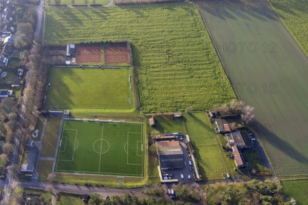 Aerial view of the football ground ofDJK Blau-Weiß Lavesum 1931 and tennis court in the district Lavesum in Haltern am See in the Ruhr area in North Rhine-Westphalia, Germany, Am cemetery, DE, Europe, football ground, football stadium, football club, Haltern am See, aerial view, aerial photograph, aerial photography, aerial photography, North Rhine-Westphalia, Ruhr area, sports, sports facilities, sports field, sports facility, stadium, tennis, tennis facility, tennis courts, overview, bird's-eye view, birds-eyes view, overview