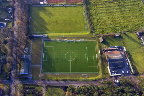 Aerial view of the football ground ofDJK Blau-Weiß Lavesum 1931 and tennis court in the district Lavesum in Haltern am See in the Ruhr area in North Rhine-Westphalia, Germany, Am cemetery, DE, Europe, football ground, football stadium, football club, Haltern am See, aerial view, aerial photograph, aerial photography, aerial photography, North Rhine-Westphalia, Ruhr area, sports, sports facilities, sports field, sports facility, stadium, tennis, tennis facility, tennis courts, overview, bird's-eye view, birds-eyes view, overview