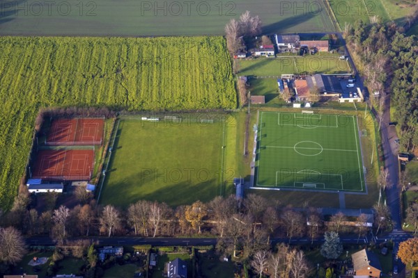 Aerial view of the football ground ofDJK Blau-Weiß Lavesum 1931 and tennis court in the district Lavesum in Haltern am See in the Ruhr area in North Rhine-Westphalia, Germany, Am cemetery, DE, Europe, football ground, football stadium, football club, Haltern am See, aerial view, aerial photograph, aerial photography, aerial photography, North Rhine-Westphalia, Ruhr area, sports, sports facilities, sports field, sports facility, stadium, tennis, tennis facility, tennis courts, overview, bird's-eye view, birds-eyes view, overview