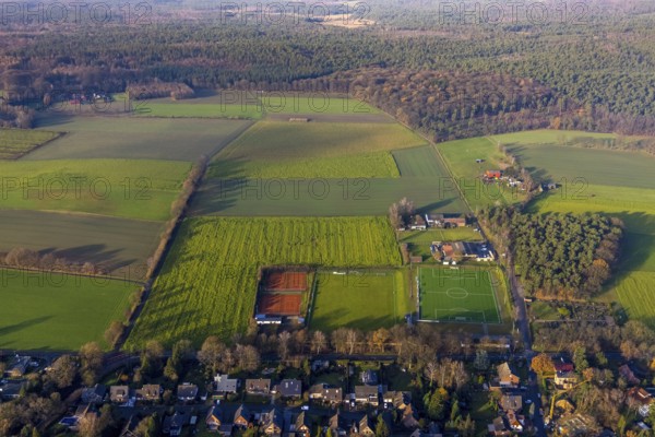 Aerial view of the football ground ofDJK Blau-Weiß Lavesum 1931 and tennis court in the district Lavesum in Haltern am See in the Ruhr area in North Rhine-Westphalia, Germany, Am cemetery, DE, Europe, football ground, football stadium, football club, Haltern am See, aerial view, aerial photograph, aerial photography, aerial photography, North Rhine-Westphalia, Ruhr area, sports, sports facilities, sports field, sports facility, stadium, tennis, tennis facility, tennis courts, overview, bird's-eye view, birds-eyes view, overview