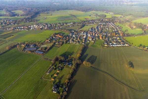 Aerial view of the catholic St.St. Anthony's Church and local view of Lavesum in Haltern am See in the Ruhr area in North Rhine-Westphalia, Germany, place of worship, DE, Europe, religious community, place of worship, property tax, Haltern am See, sacred site, real estate, church, parish, denomination, aerial view, aerial photo, aerial photography, aerial photography, North Rhine-Westphalia, religion, religious site, Ruhr area, overview, bird's-eye view, residential area, living and life, residential area, residential buildings, residential quality, residential neighbourhood, housing estate, birds-eyes view, overview, red roofs