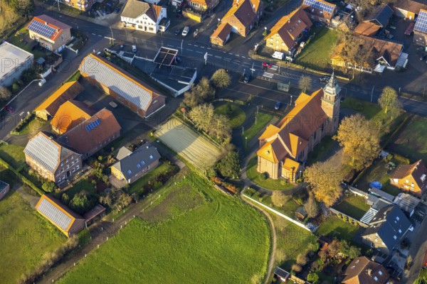 Aerial view of the catholic St.St. Anthony's Church and local view of Lavesum in Haltern am See in the Ruhr area in North Rhine-Westphalia, Germany, place of worship, DE, Europe, religious community, place of worship, property tax, Haltern am See, sacred site, real estate, church, parish, denomination, aerial view, aerial photo, aerial photography, aerial photography, North Rhine-Westphalia, religion, religious site, Ruhr area, overview, bird's-eye view, residential area, living and life, residential area, residential buildings, residential quality, residential neighbourhood, housing estate, birds-eyes view, overview, red roofs