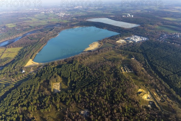 Aerial view of Silbersee II and Silbersee II in the forest area with KSPE Kalksandstein-Planelemente Verwaltungsgesellschaft mbH for quartz sand extraction in the district of Lehmbraken in Haltern am See in the Ruhr area in North Rhine-Westphalia, Germany, bathing lake, DE, Europe, commercial enterprises, commercial area, industrial estate, commercial park, commercial site, commercial use, Haltern am See, industrial area, industrial building, industrial site, aerial view, aerial photograph, aerial photography, aerial photography, North Rhine-Westphalia, quartz sand extraction, Ruhr area, lake, overview, bird's-eye view, forest area, birds-eyes view, overview