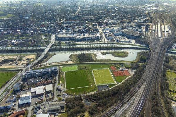 Aerial view, construction site Erlebensraum Lippeaue, Datteln-Hamm-Kanal, Hammer Technologie- und Gründerzentrum Hamtec, sports fields of HTC Hockey- und Tennisclub Hamm, shopping centre Alleecenter, Hamm, Ruhr area, North Rhine-Westphalia, Germany, DE, Europe, birds-eyes, view, aerial view, aerial photography, aerial photography, overview, overview, bird's eye view, shopping, food, clothing, consumption, consumer, technology centre, technology, company, development, waterway, shipping, transport, logistics, goods movement, ships, waters, goods, shopping, textiles