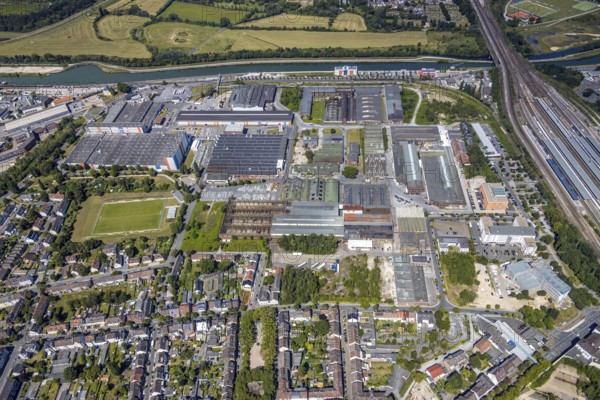 Aerial view, industrial area at the canal west of the main station, former Thyssen site, harbour, Hamm, Ruhr area, North Rhine-Westphalia, Germany, DE, Europe, birds-eyes, view, aerial photograph, aerial photography, aerial photography, overview, bird's eye view, Datteln-Hamm canal, industrial area, industry, manufacturing, production, train traffic, railway traffic, traffic connection, travel, holiday