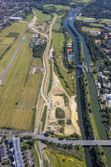 Aerial view, construction site Erlebensraum Lippeaue, Datteln-Hamm-Canal, sports fields of HTC Hockey- und Tennisclub, airfield EDLH, Hamm, shopping centre Alleecenter, Ruhr area, North Rhine-Westphalia, Germany, DE, Europe, birds-eyes, view, aerial view, aerial photography, aerial photography, overview, overview, bird's-eye view, Lippe, Hamm-Datteln-Kanal, shopping, food, clothing, consumption, consumer, technology centre, technology, company, development, waterway, shipping, transport, logistics, goods movement, ships, waters, goods, shopping, textiles, airfield, flying, air sports, leisure, pilot