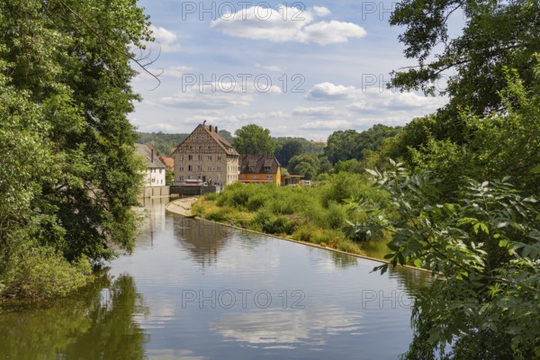 Riparian impression of Berlichingen at river Jagst in southern Germany at summer time