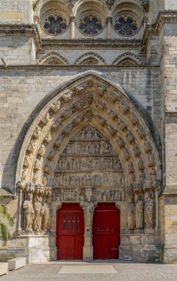 Portal of the north transept at the Reims Cathedral in Reims, the most populous city in the French department of Marne