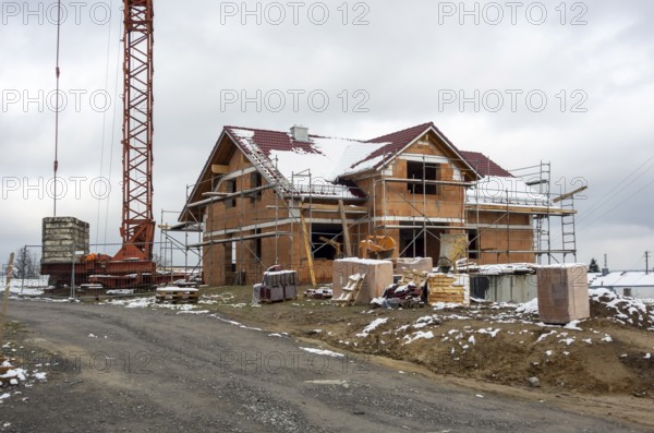 House construction scenery at winter time