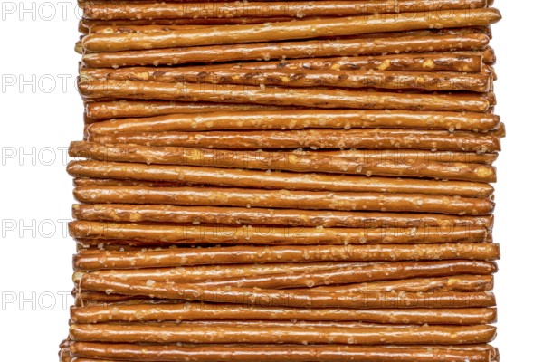 Closeup of some salt sticks in light back