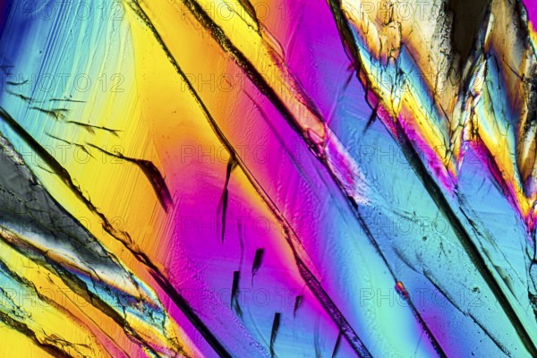 Colorful microscopic shot of Sucrose micro crystals in polarized light