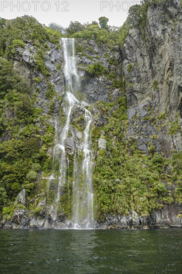 Waterfall around Milford Sound at the South Island of New Zealand