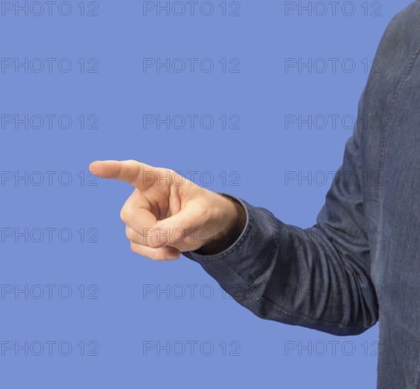 Pointing male hand in blue back