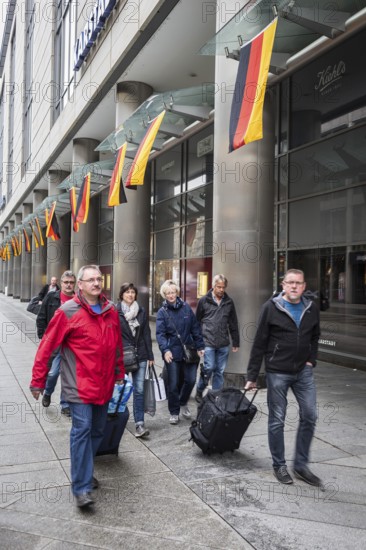DEU Germany Germany Dresden Celebrating German unity in the 26th year of reunification.tourists on their way to the main railway station