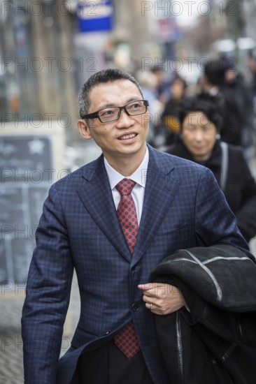 DEU Germany Germany Berlin Chinese billionaire Charles Chen Yidan during a meeting with Taz journalists
