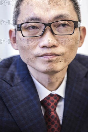 DEU Germany Germany Berlin Chinese billionaire Charles Chen Yidan during a meeting with Taz journalists