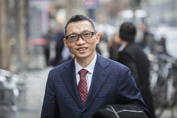 DEU Germany Germany Berlin Chinese billionaire Charles Chen Yidan during a meeting with Taz journalists