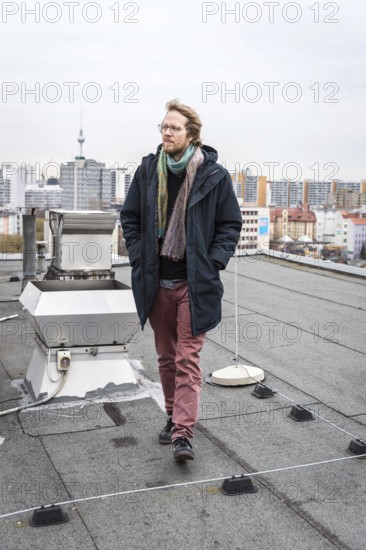 DEU Germany Germany Berlin The city councillor for Kreuzberg-Friedrichshain, Florian Schmidt, poses on the roof of the old town hall in Kreuzberg