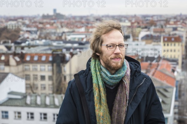 DEU Germany Germany Berlin The city councillor for Kreuzberg-Friedrichshain, Florian Schmidt, poses on the roof of the old town hall in Kreuzberg