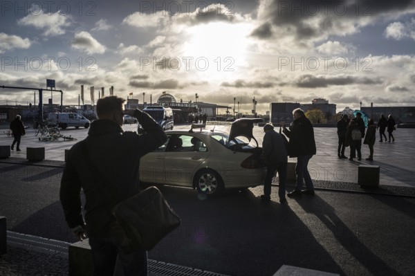 DEU Germany Germany Berlin Traveller looking for a taxi during the EVG strike at the main station on Monday morning