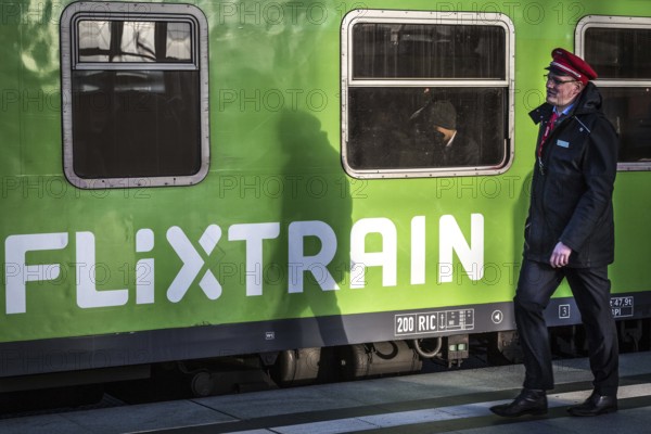 DEU Germany Germany Berlin A railway employee passes a Flixtrain during the EVG strike at the main station on Monday morning
