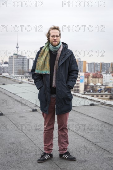 DEU Germany Germany Berlin The city councillor for Kreuzberg-Friedrichshain, Florian Schmidt, poses on the roof of the old town hall in Kreuzberg