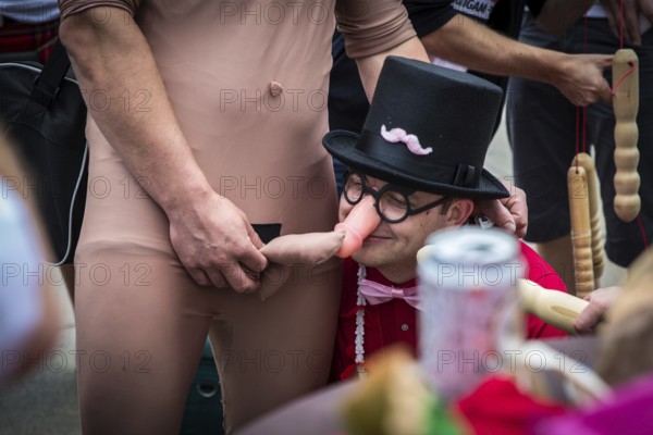 DEU Germany Germany Berlin The grooms of two bachelor parties exchange rituals during their meeting on Alexanderplatz